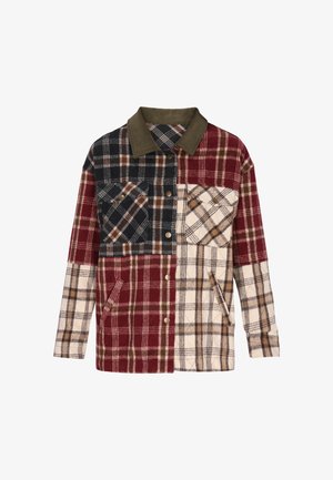 Kockás ingdzseki foltos piros, tengerészkék és bézs árnyalatokban. Gallérral, két mellzsebbel és gombos záródással rendelkezik. Puha szövettextúra.