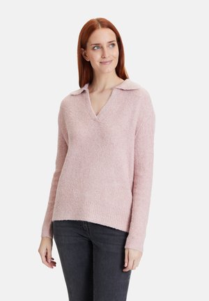 Helles rosa Sweater aus einem flauschigen Material mit V-Ausschnitt und Kragen. Langen Ärmeln und lockerer Passform, mit einem gerippten Saum.