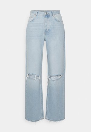 Jeans in denim blu chiaro con vita alta, silhouette a gamba larga e dettagli strappati sulle ginocchia. Finiture a orlo grezzo e leggera scoloritura.