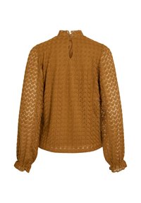 Blusa in pizzo marrone con maniche lunghe, collo alto e dettaglio a chiave sul retro. Presenta un motivo geometrico testurizzato e polsini arricciati.