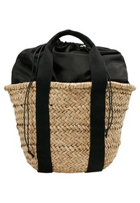 Borsa in paglia tessuta con chiusura a cordoncino in tessuto nero e due ampi manici neri che si estendono lungo i lati.