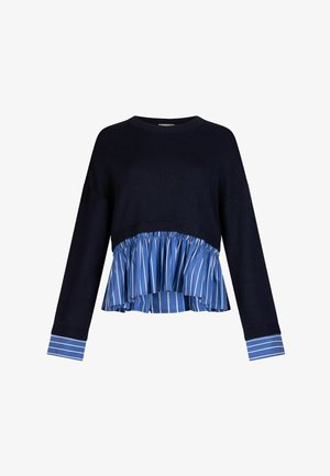 Mornarsko plavi džemper s dugim rukavima, sa volanom na rubu u plavo-bijele okomite pruge i odgovarajućim prugastim manšetama.