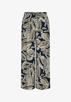 Pantalon à jambes larges avec taille élastique, présentant un motif feuille abstrait audacieux en beige et blanc sur fond noir.