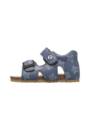 Sandalo blu per bambini con stampe di tartarughe, cinturini regolabili in Velcro e suola in sughero, progettato per comfort e supporto.