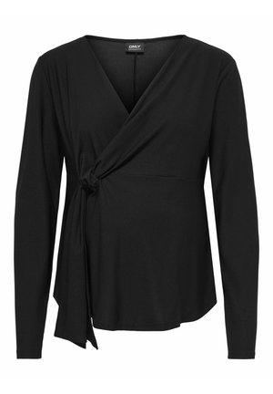 Haut de maternité noir à manches longues avec col en V et détail d'attache sur le côté, marque Only Maternity, fond uni.