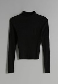 Haut noir à col roulé côtelé à manches longues, de coupe courte. Présente un col ajusté et une texture douce, idéal pour superposer.