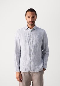 Striped long-sleeve shirt in blue and white, made of fabric with a soft texture. Features a button-down collar and a single chest pocket.