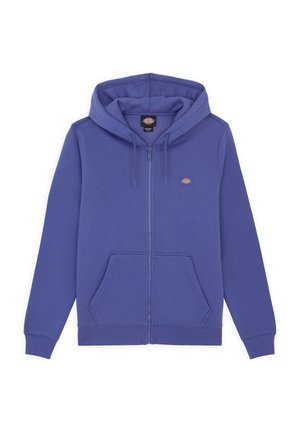 Sudadera con cremallera de color morado, fabricada en una mezcla de algodón, que cuenta con un bolsillo frontal, capucha ajustable con cordón y un logotipo en el lado izquierdo del pecho.