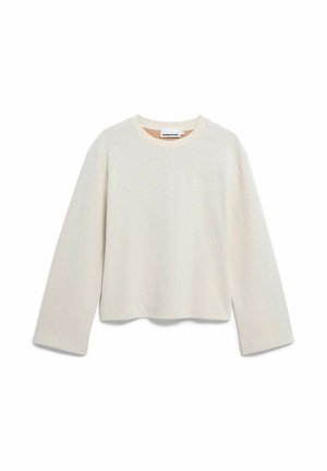 Lichtbeige cropped sweatshirt met lange mouwen, ronde halslijn en zijslits; gemaakt van zachte stof met een gladde textuur.