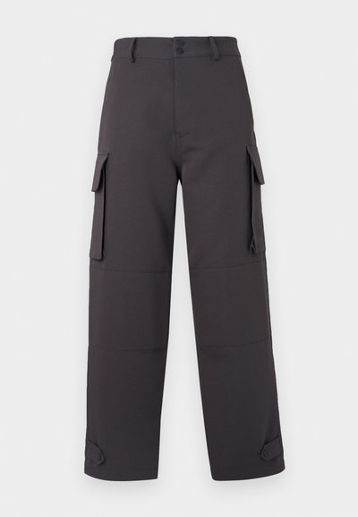 Cargo pants in donkergrijs, gemaakt van een soepele stof, met twee zijzakken en knoopsluitingen. Losse pasvorm met geknopte zoom.