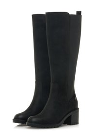 Botas negras hasta la rodilla hechas de ante suave, con un tacón grueso y paneles elásticos en los laterales. Suela de goma texturizada para mayor agarre.