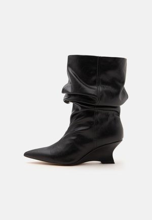 ALDO, CALAIN - Bottines compensées - black