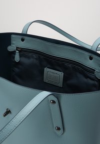 COACH Kabelka - light blue