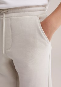 WE Fashion Spodnji deli trenirk - beige