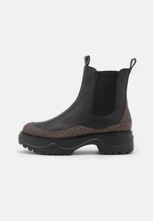 Enkellaarsjes met plateauzool - black