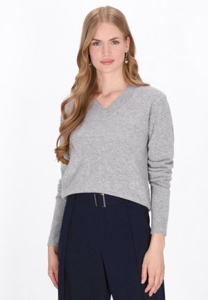 - Sweter