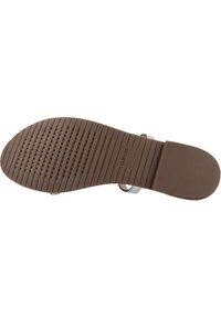 Suela de goma marrón con superficie texturizada y perforaciones para ventilación. Presenta un accesorio de correa y bordes suaves.