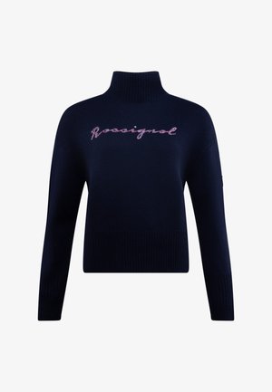 Svetřík v námořnické modři pletený s vysokým límcem, s žebrovaným lemem a manžetami. Na hrudi je vyšitý nápis "Rossignol" v růžové barvě.