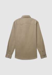 Langärmliges Hemd, beige, aus strukturiertem Stoff. Verfügt über einen klassischen Kragen, Knopfmanschetten und einen geraden Rückensaum. Keine Vorderseitenverzierung.