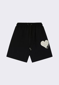 Shorts en coton noirs avec une taille élastique, un cordon de serrage et un motif graphique en forme de cœur blanc sur le côté gauche.