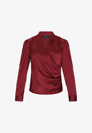 Burgundin satiininen pitkähihainen paita, jossa on kääntömuotoilu, sivuilla rypytetty yksityiskohta ja muodokkaat hartiat. Silkkinen tekstuuri, tyylikäs siluetti.