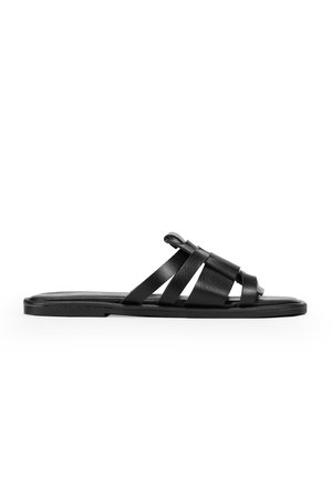 Schwarze Leder-Sandalen mit mehreren überkreuzten Riemen, flacher Sohle und glatter Oberfläche. Einfaches Design ohne Verzierungen.