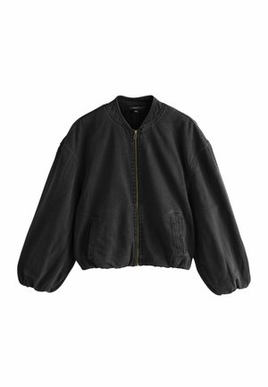 Czarna, oversize'owa kurtka bomber z przednim zamkiem błyskawicznym, dwoma bocznymi kieszeniami, elastycznymi mankietami i dolnym wykończeniem, wykonana z miękkiego materiału.