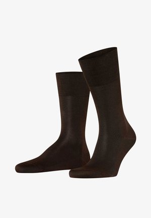 Brune bomuldsstrømper med en glat tekstur, ribbet top og et klassisk crew-længde design. Velegnet til hverdagsbrug og alsidighed.