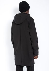 Schott LONG URBAN DÉPERLANT - Veste imperméable - noir
