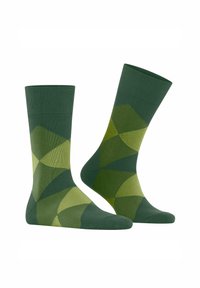 Calzini verdi con un motivo geometrico in tonalità di verde scuro e chiaro, esposti insieme su uno sfondo bianco.