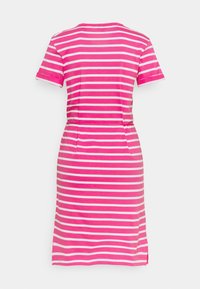 Pink and white striped dress with short sleeves, crew neck, and a fitted waist. Slightly tapered at the hem with side slits for mobility.