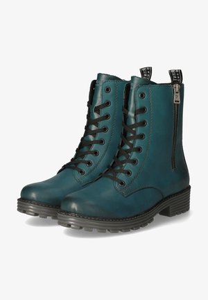 Teal leather ankle boots with a round toe, black laces, side zipper, and rubber sole featuring traction ridges. Stitched detailing along seams.