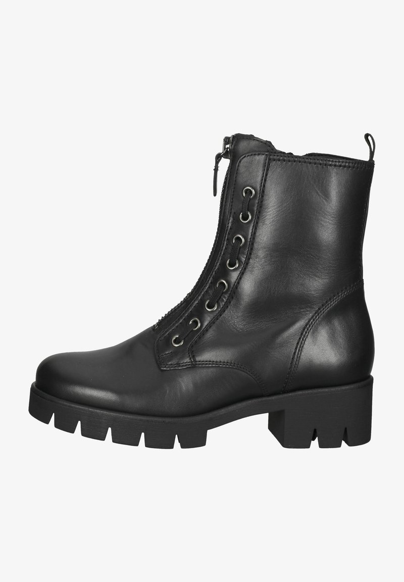 Bottine en cuir noir avec fermeture éclair latérale, détails à lacets, semelle épaisse en caoutchouc noir et finition de surface texturée.