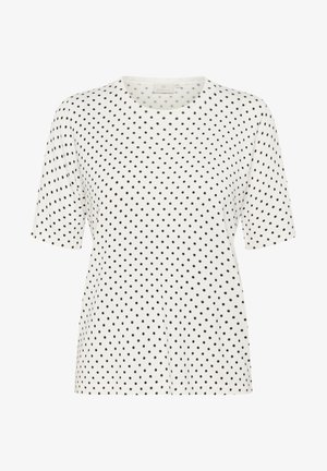 White short-sleeve t-shirt with a round neckline, featuring a pattern of small black dots throughout. Soft fabric with a relaxed fit.