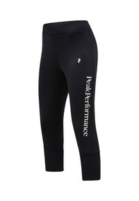 Zwarte cropped sportleggings met het "Peak Performance" logo verticaal aan de zijkant gedrukt en een klein merkembleem near de heup.