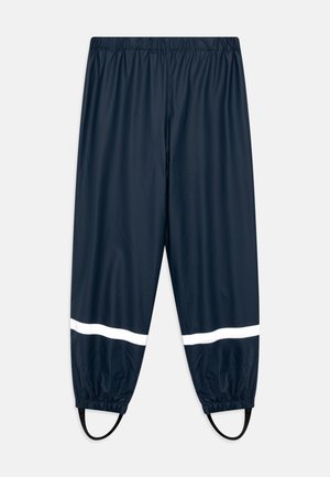 Morske vodoodporne hlače z elastičnim pasom, belimi odsevnimi črtami in elastičnimi manšetami. Imajo dodatne trakove pri gležnjih za prilagoditev.