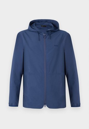 Casaco leve azul-marinho com capuz, fecho éclair completo e punhos elásticos. Apresenta um design minimalista e um logótipo discreto no peito.
