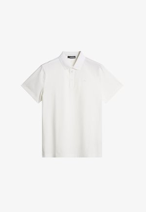 Polo blanc avec un col classique, une patte de boutonnage à trois boutons et un logo discret sur la poitrine. Fabriqué en tissu en coton doux et respirant.