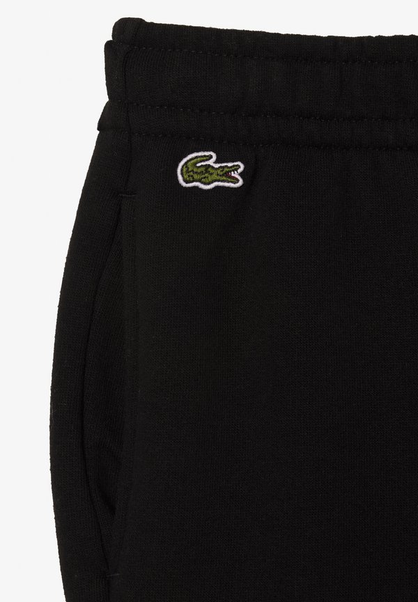 UNISEX - Tracksuit bottoms - noir2