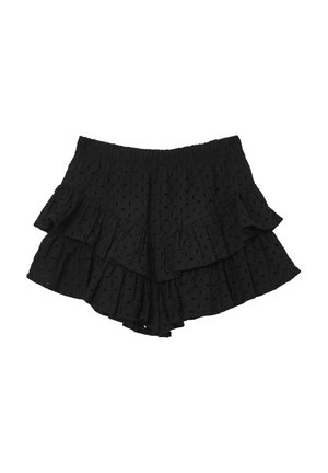 Pantaloni corti neri a ruffle realizzati in tessuto testurizzato con motivi a pois. Presentano un elastico in vita e un design a strati per un volume aggiuntivo.