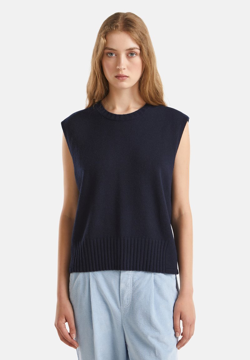Granatowy bezrękawnik z prążkowanym dołem i okrągłym dekoltem, wykonany z miękkiego materiału, z luźnym krojem i gładką teksturą.