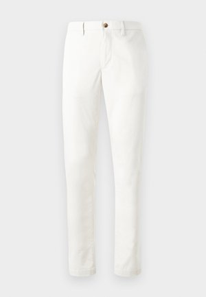 White tailored slim-fit trousers with belt loops and a button closure, displayed against a plain light background.