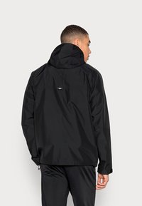 Nike Sportswear Vandeniui atspari striukė - black/black