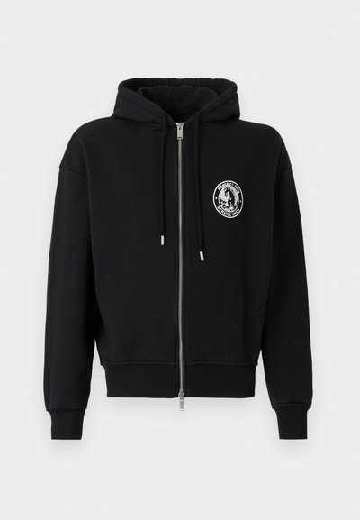 Black zip-up hoodie made of cotton blend, featuring a front logo patch, a drawstring hood, and ribbed cuffs and hem.
