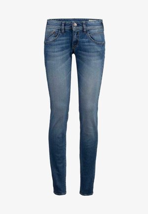 Skinny jeans in medium blue denim. Classic five-pocket design with subtle fading. Stitched accents and a zip fly with a button closure.