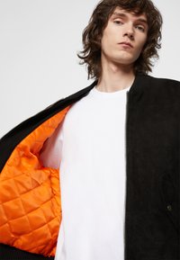 Deadwood COMBO - Casaco de couro - black