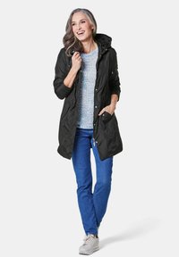 GOLDNER TRENDIGER FUNKTIONALEM - Regenjas - black