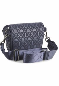 Navy crossbody bag with embossed geometric patterns, zip closure, and a detachable satin shoulder strap featuring a diamond pattern.