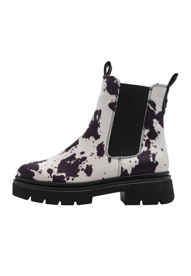 Chelsea boot noir et blanc à pois avec un dessus texturé, panneau latéral élastique et semelle épaisse noire. Tirette renfoncée à l'arrière.