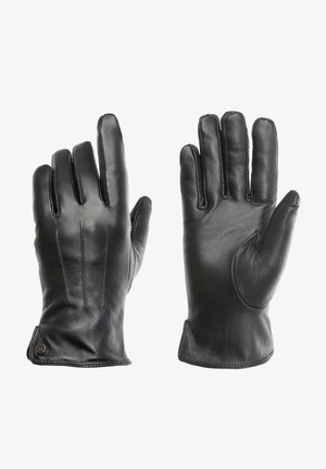 Schwarze Lederhandschuhe mit fünf Fingern, die eine glatte Textur, gefaltete Nähte und ein kleines rundes Logo-Element am Handgelenk aufweisen.